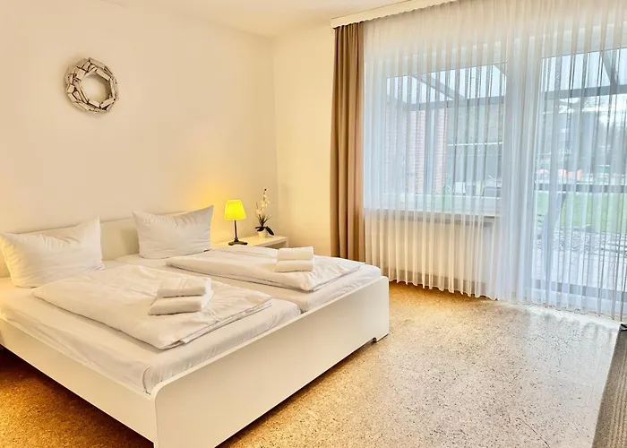 Moderne Ferienwohnung Brazil im EG mit eingezäuntem Garten und Terrasse in Südwestlage!